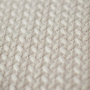 Manta de lã texturizada para puff Trançada Bege