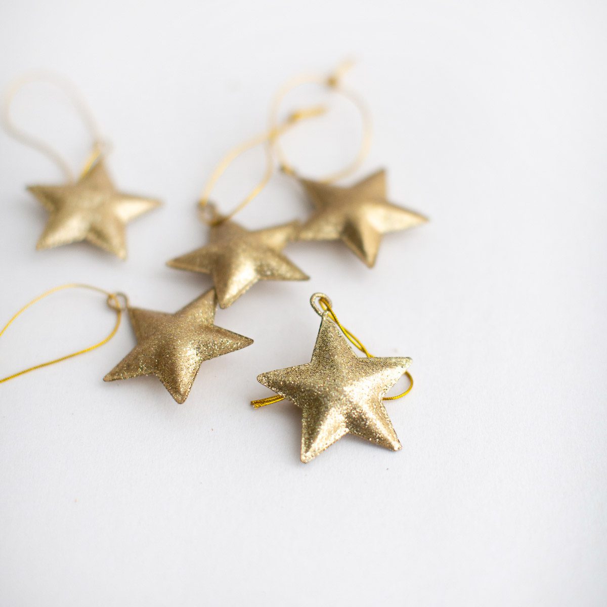 Estrelas para árvore com guizo - kit com 5 unidades Dourado